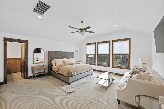 bedroom with carpet flooring, ceiling fan, and vaulted ceiling