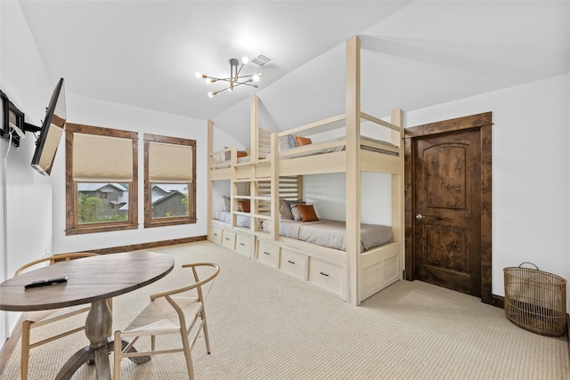 bedroom featuring vaulted ceiling, light carpet, and a chandelier