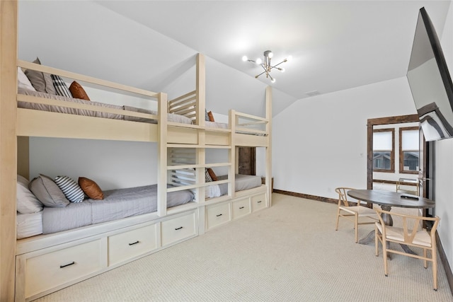 carpeted bedroom featuring vaulted ceiling and a chandelier