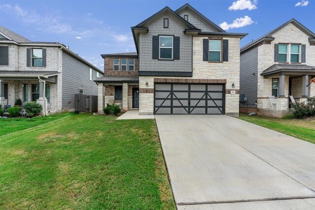 craftsman house with a garage and a front yard