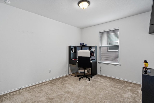 office area with baseboards and carpet flooring