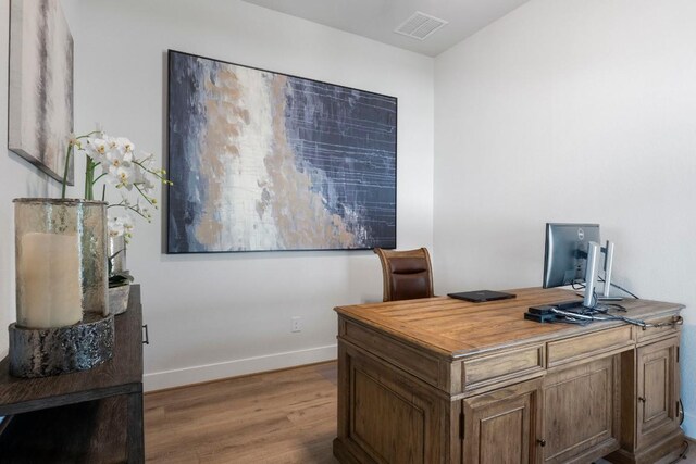 office featuring hardwood / wood-style floors