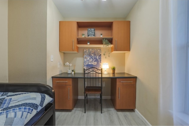 bedroom featuring light wood-type flooring