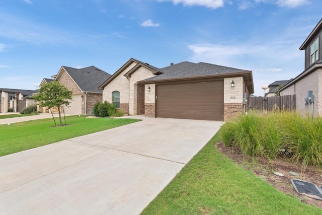 view of front facade featuring a front lawn and a garage