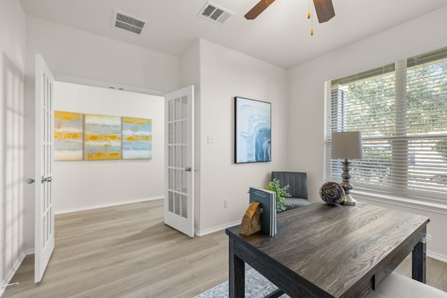 office area featuring light hardwood / wood-style flooring and ceiling fan