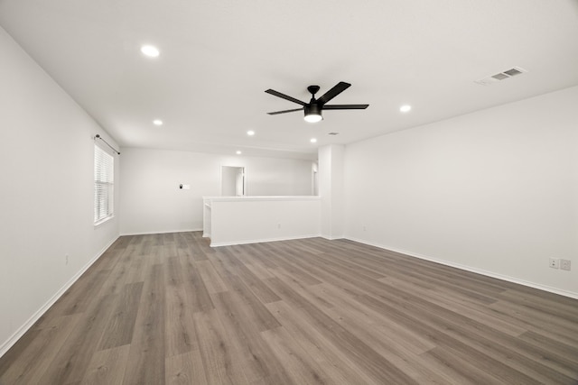 unfurnished room featuring wood-type flooring and ceiling fan