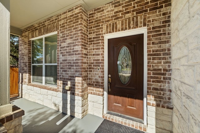 entrance to property with a porch