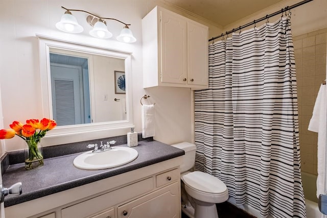 full bathroom featuring vanity, toilet, and shower / tub combo