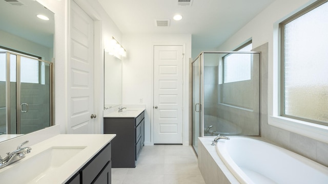 bathroom with vanity, separate shower and tub, and tile patterned floors