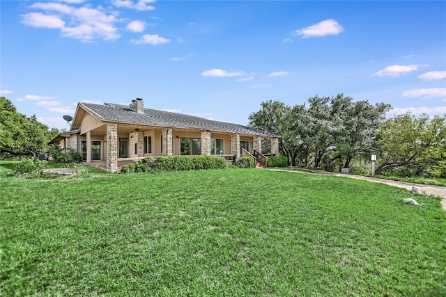 single story home featuring a front yard