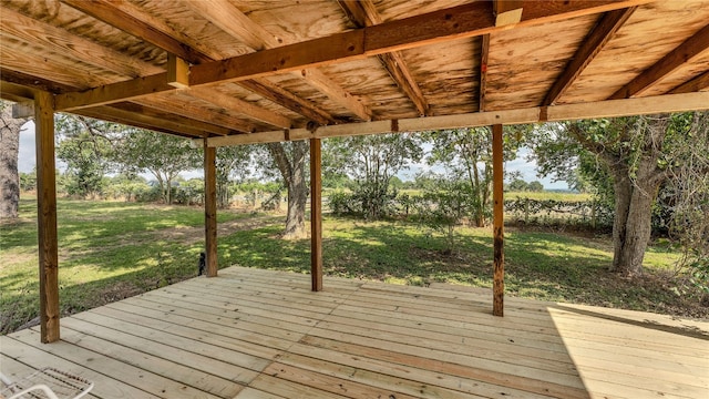 wooden deck with a yard