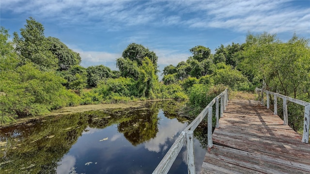 view of dock with a water view