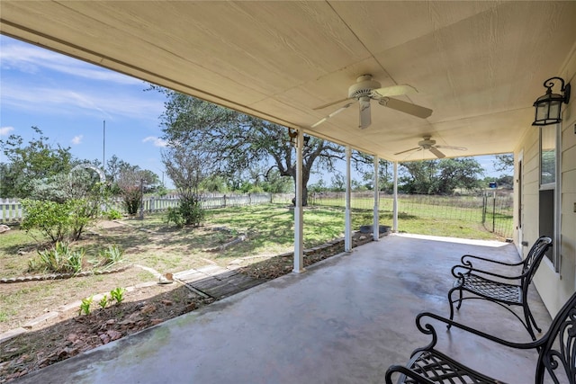 view of patio featuring ceiling fan