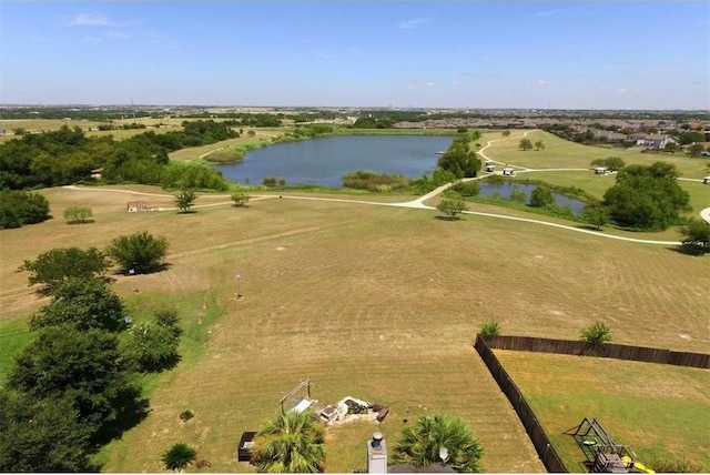 aerial view with a water view and a rural view