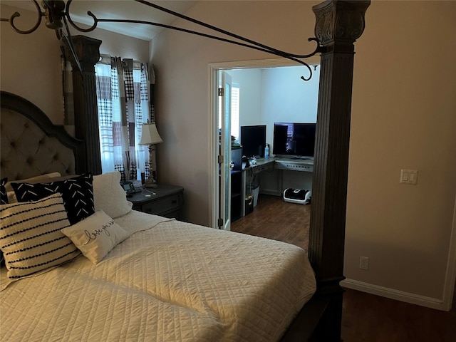 bedroom featuring hardwood / wood-style floors