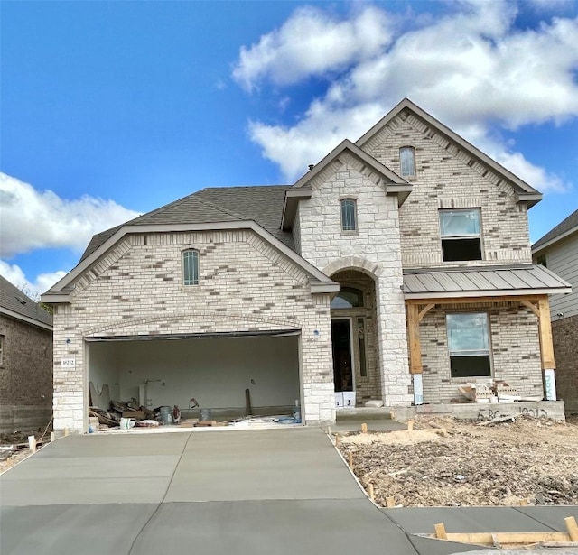 view of front of home featuring a garage