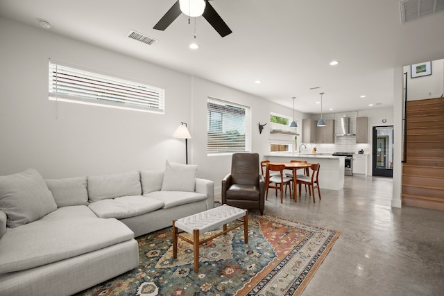 living room with ceiling fan