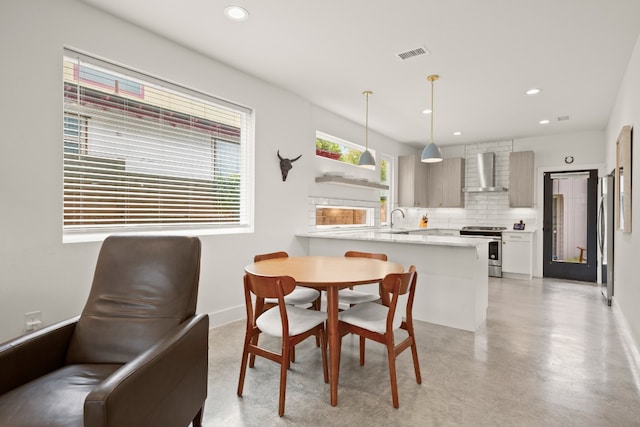 dining space with sink