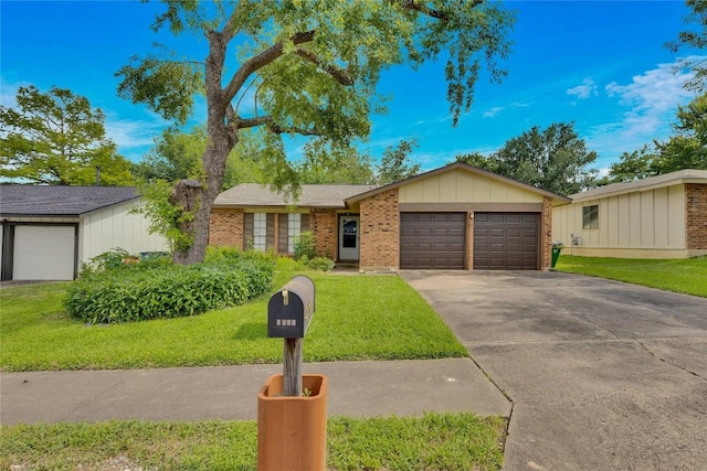 ranch-style house with a front yard and a garage