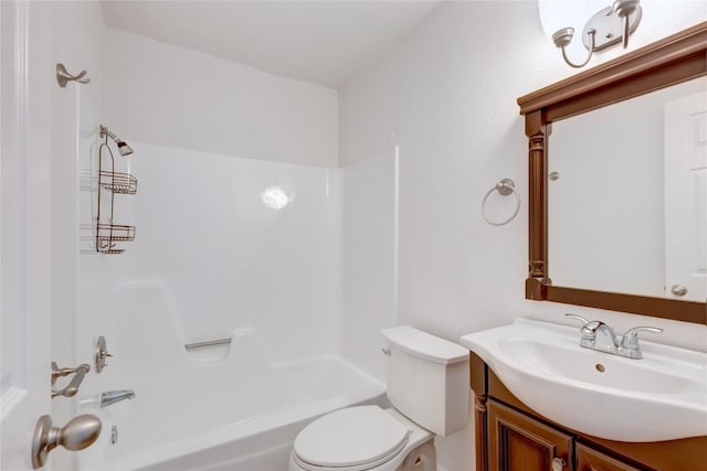 full bathroom with vanity, toilet, and shower / washtub combination