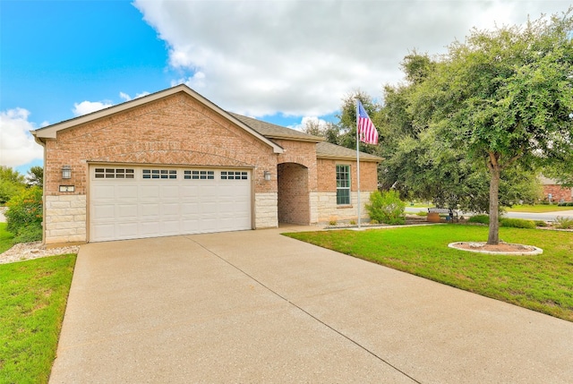 view of front facade featuring a garage and a front lawn