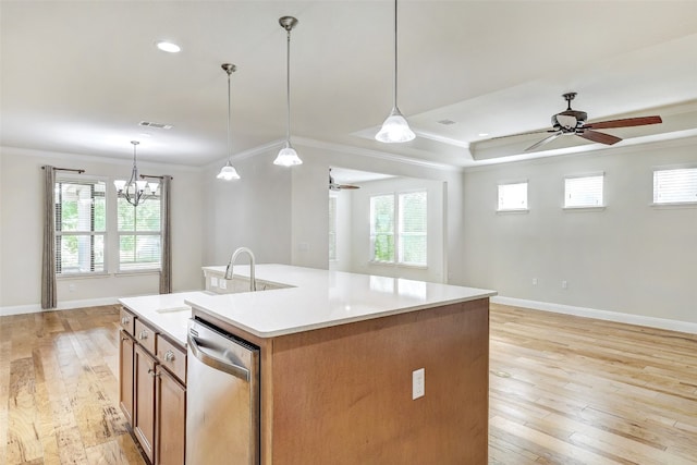 kitchen with ceiling fan with notable chandelier, a kitchen island with sink, dishwasher, light wood-type flooring, and a wealth of natural light