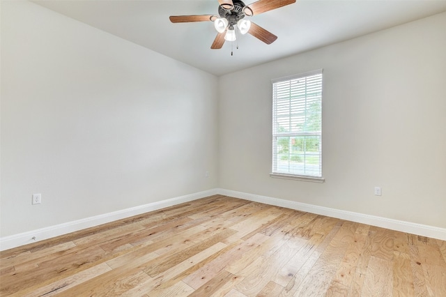 unfurnished room with ceiling fan and light hardwood / wood-style floors