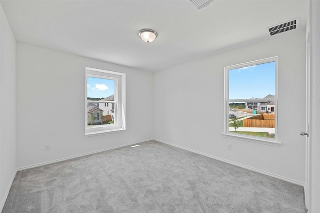 213 Skipping Stone Run, Georgetown, TX 78628 - spare room featuring carpet flooring and baseboards