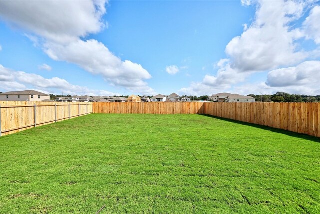 213 Skipping Stone Run, Georgetown, TX 78628 - fenced backyard featuring a residential view