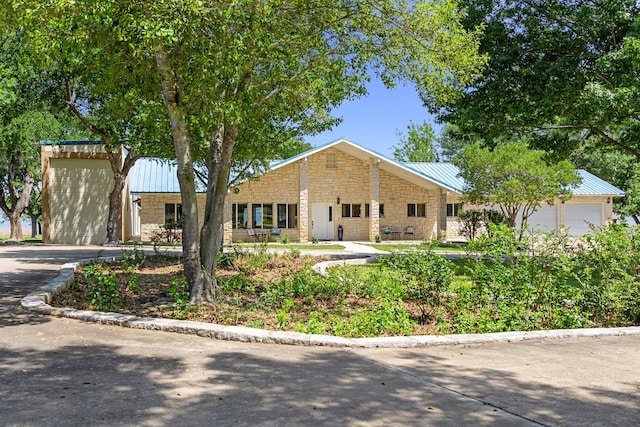 view of front of property with a garage