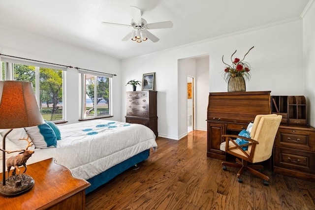 bedroom with ornamental molding, dark hardwood / wood-style flooring, and ceiling fan