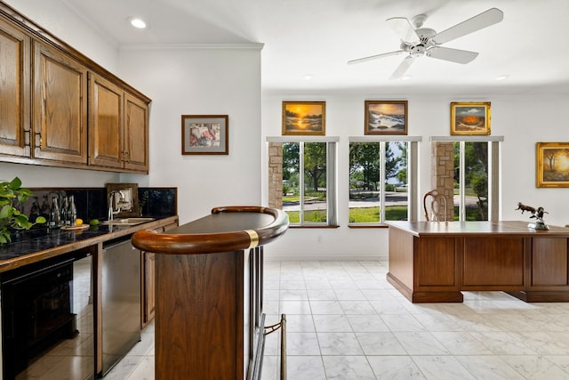 kitchen with backsplash, dishwasher, crown molding, ceiling fan, and sink