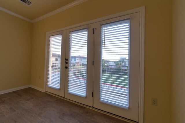 2101 Town Centre Dr Unit 1408, Round Rock, TX 78664 - doorway with french doors, crown molding, wood finished floors, and baseboards