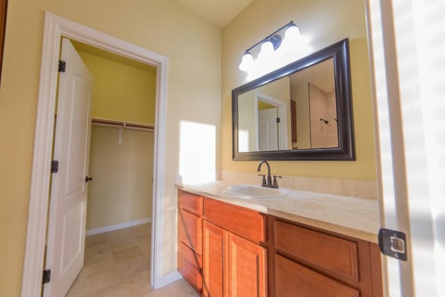 2101 Town Centre Dr Unit 1408, Round Rock, TX 78664 - bathroom with vanity, tile patterned floors, and baseboards