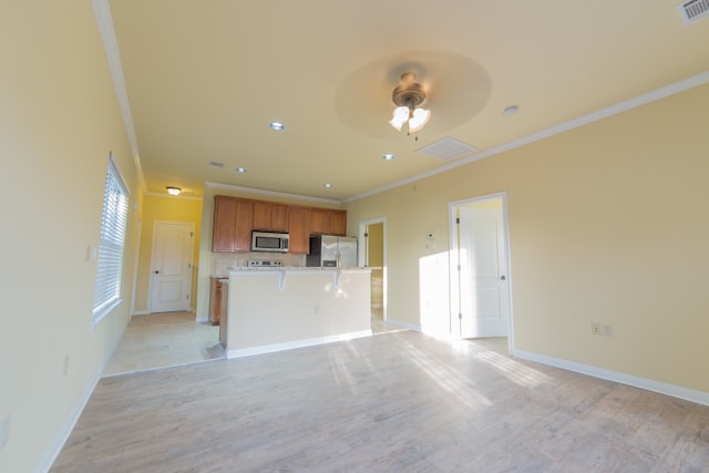 unfurnished living room featuring ornamental molding, ceiling fan, and light hardwood / wood-style floors