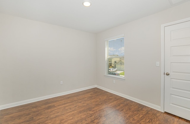 empty room featuring dark hardwood / wood-style floors