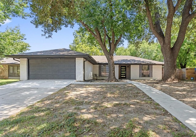 ranch-style home with a garage