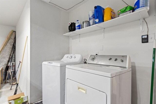 washroom with separate washer and dryer