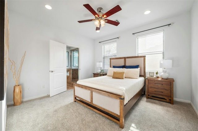 carpeted bedroom featuring ceiling fan