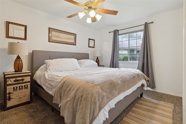 carpeted bedroom featuring ceiling fan