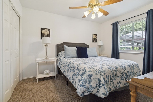 bedroom with carpet, ceiling fan, and a closet