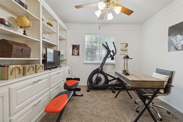 workout area with ceiling fan and carpet floors