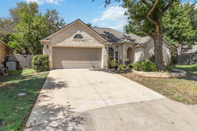 ranch-style home with a garage