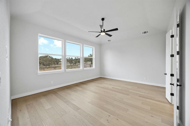 spare room featuring ceiling fan and light wood-type flooring