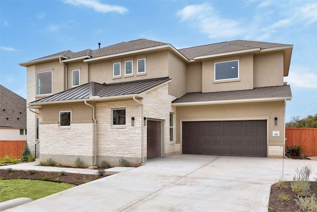 view of front of property featuring a garage