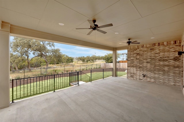 view of patio featuring ceiling fan