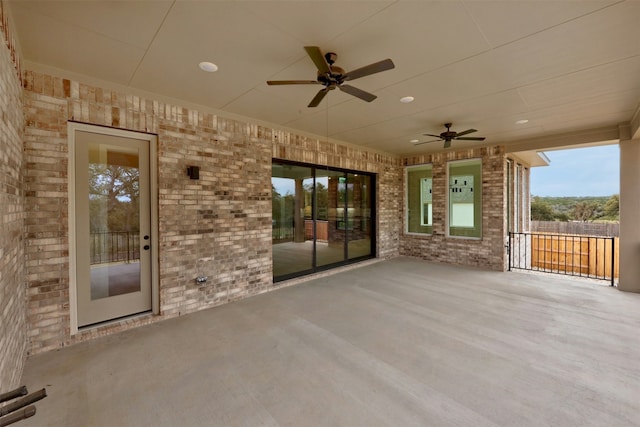 view of patio featuring ceiling fan