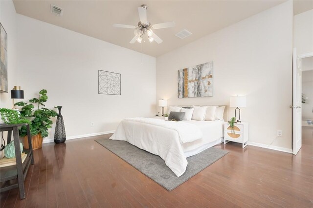 bedroom featuring ceiling fan and dark hardwood / wood-style flooring