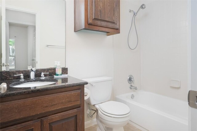 full bathroom featuring vanity, toilet, and shower / tub combination