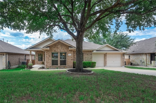 ranch-style home featuring a front yard and a garage